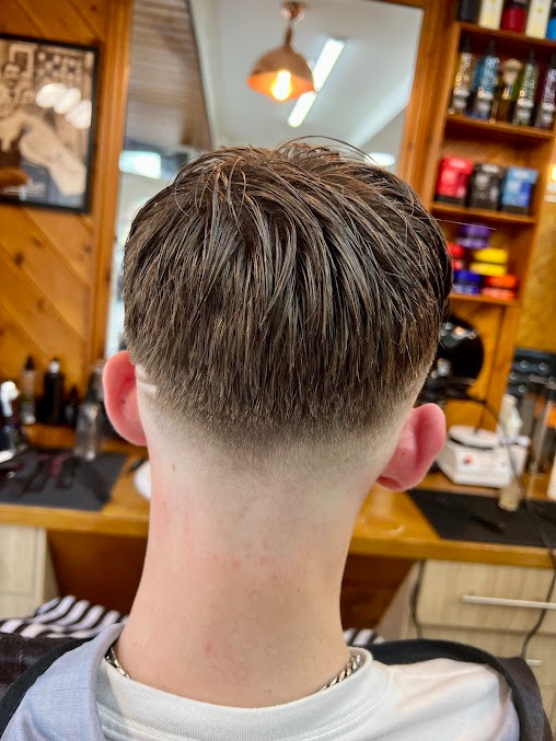 Textured crop with tapered back